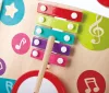 Zenélő járássegítő hangszerekkel 10 hó+ – Hape